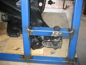 A small amount was cut off the MX5 subframe ends to make it more compact.  The open ends were closed off by welding steel plates in place.  A crush tube has been welded into the square chassis tube for the mounting bolt and the section was later reinforced with a steel plate.