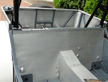 After the chassis was painted the aluminium interior panels were fixed in place using Sikaflex 227 adhesive and rivets.